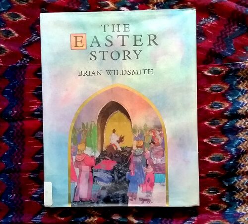 The cover of The Easter Story shows Jesus riding into Jerusalem on Palm Sunday.